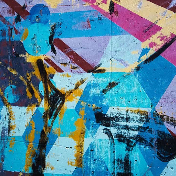 White walls adorned with large, framed artwork or maps, enhancing the aesthetic appeal.